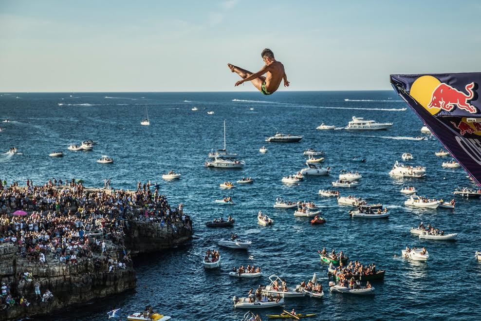 Jonathan Paredes of Mexico dives from the 27.5 metre platform during the seventh stop of the Red Bull Cliff Diving World Series, Polignano a Mare, Italy on September 13th 2015.